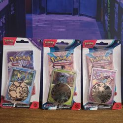 Pokemon Cards Temporal Forces Single Blister Pack (Carvanha), Paradox Rift Single Blister Pack (Sinistea), and Paradox Rift Single Blister Pack (Pinec