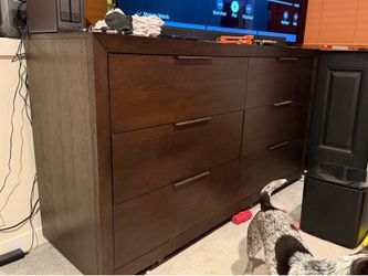 Queen size bed frame with drawers and dresser.