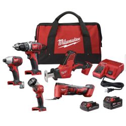Milwaukee 5 tool kit with two batteries, charger and tool bag
