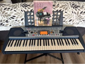 electric keyboard with stand and basic adult piano course book Yamaha PRS-280 electric keyboard with stand and basic adult piano course book