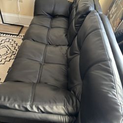 Mid-Century Modern Black Leather Futon – Folds Flat, Adjustable Arms, Great Condition