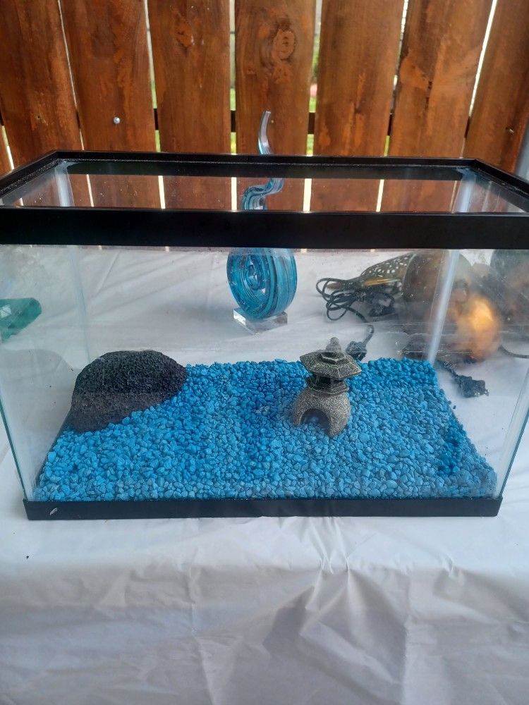 Fish Tank With Rocks And Decor