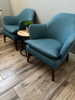 2 blue accents chairs