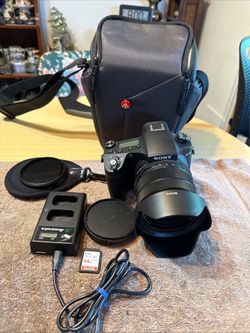 Sony RX10 IV Digital Camera 20.1MP 8.3x Optical Zoom 25x Autofocus UHD Video