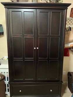 Armoire - solid dark wood