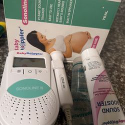 Unopened Breast Pump/Baby Doppler
