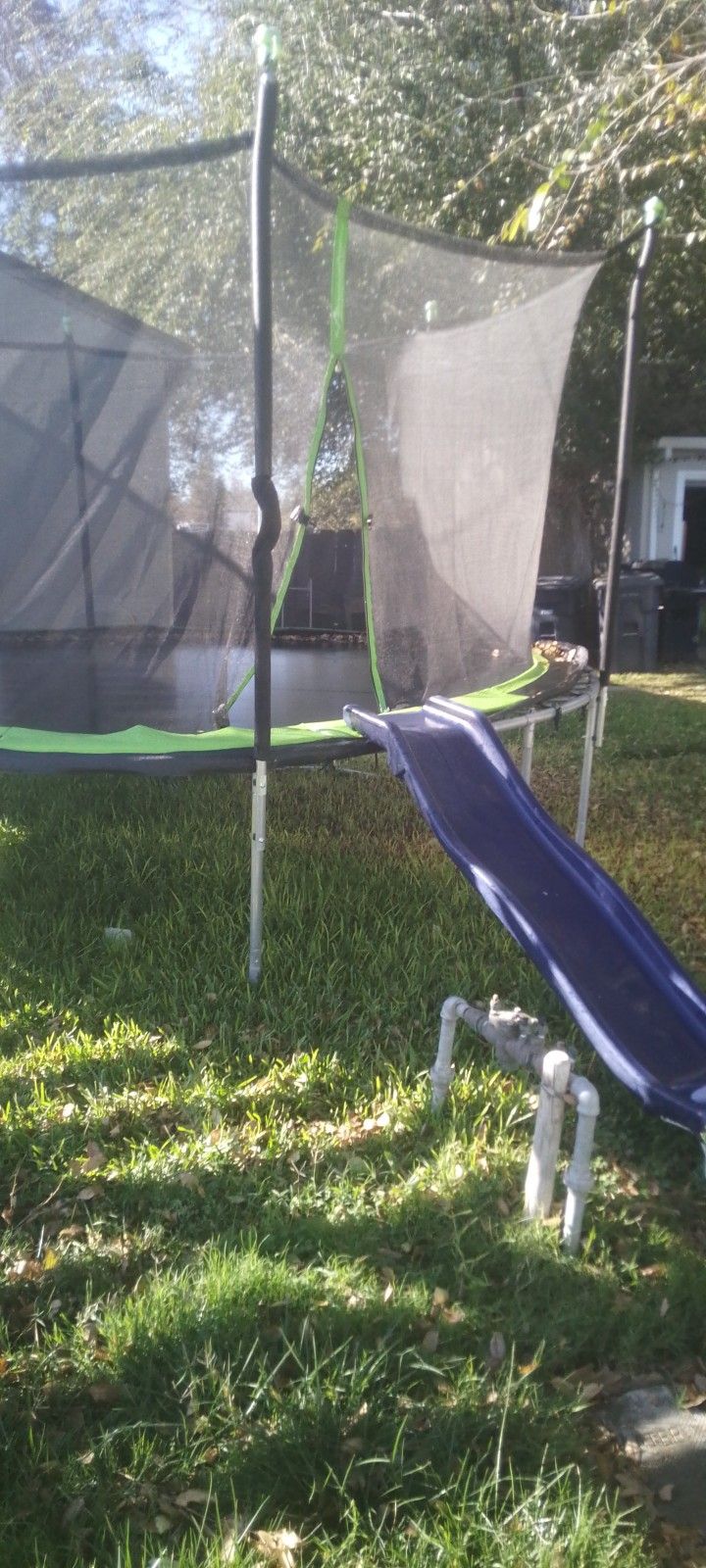 Trampoline And Swing Set With Slide