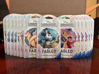 14 sealed lorcana fabled packs