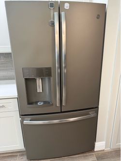 GE Appliance Refrigerator, Stove, Microwave and Dishwasher