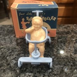 Vintage Jeryco Pink "Just Like Mother's" Plastic Toy Baby Doll Stroller In Original Box.  See pictures the box is slightly damaged with a rip. Smoke f