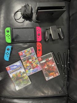 Nintendo Switch And Other Items With It 