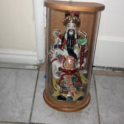 Asian statue casing