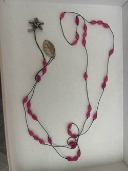 Long Pink Beaded Cord Necklace with Metal Charms / Paula Carlotta
