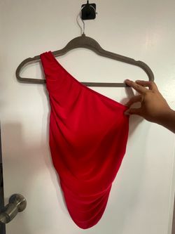 Red woman’s one shoulder top