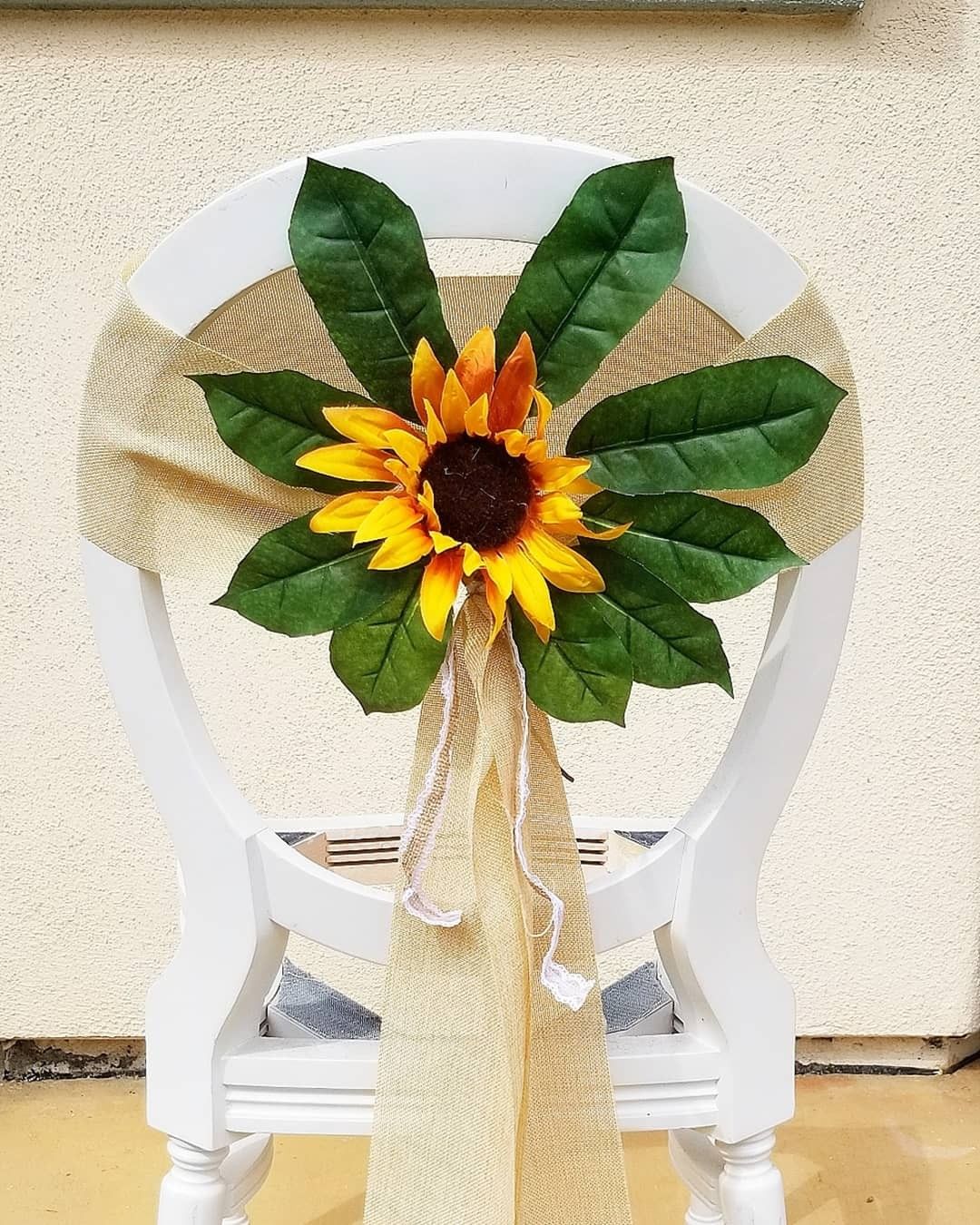 Wedding chair/pew flower decorations
