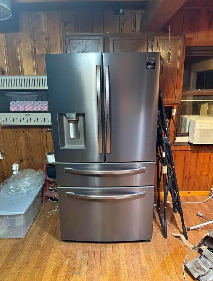 Samsung large capacity refrigerator, matching gas range plus microwave