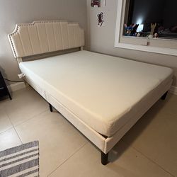 Bed frame and upholstered headboard