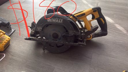 This is a DEWALT FLEXVOLT 60V MAX 7-1/4 in. Cordless Brushless Worm Drive Style Saw, typically model DCS577B.