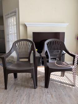 Brown plastic chair. 2 count