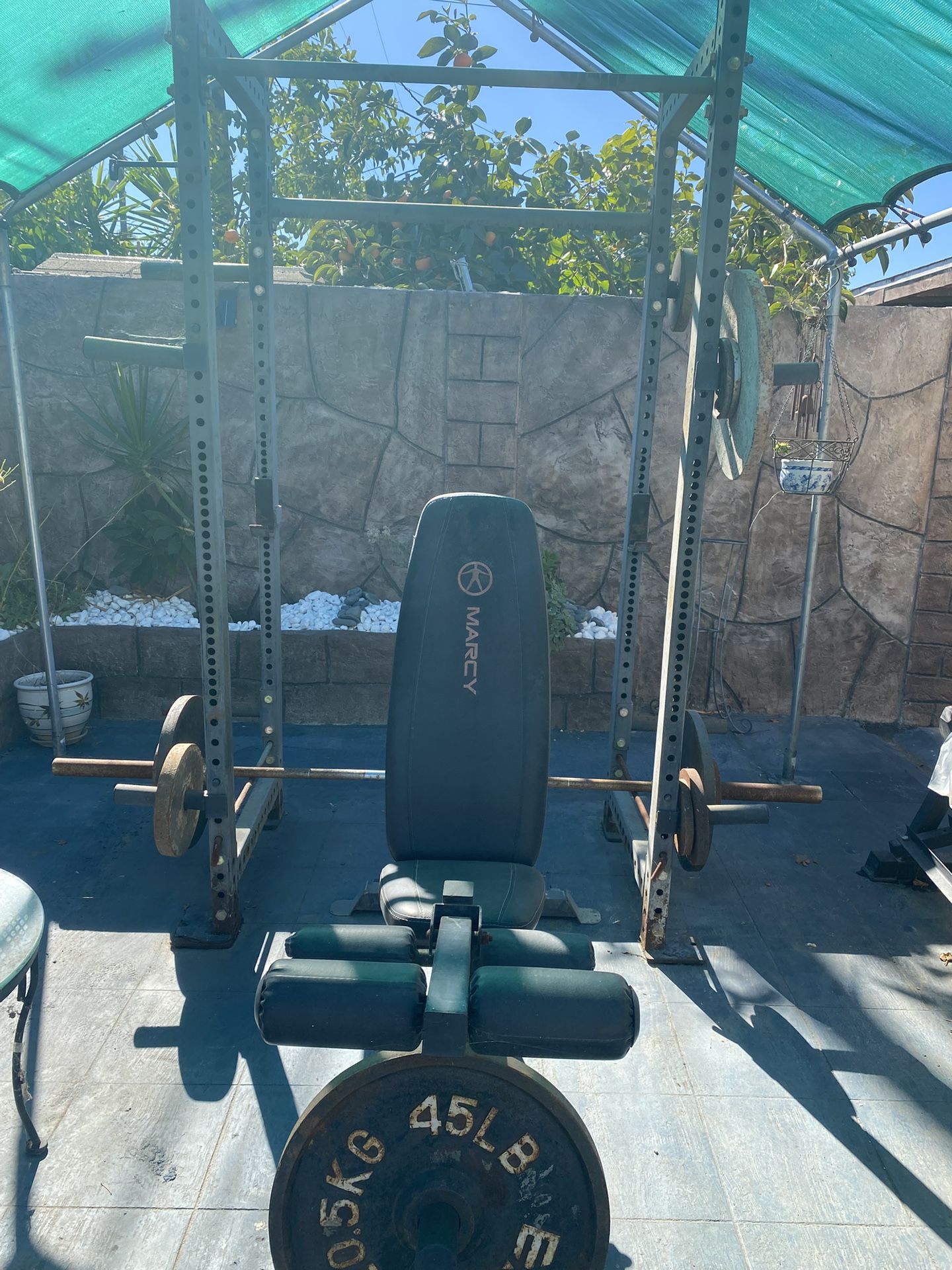 structure with bench and weights