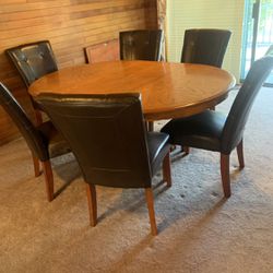 Oval claw foot dining table   seats 12    $250