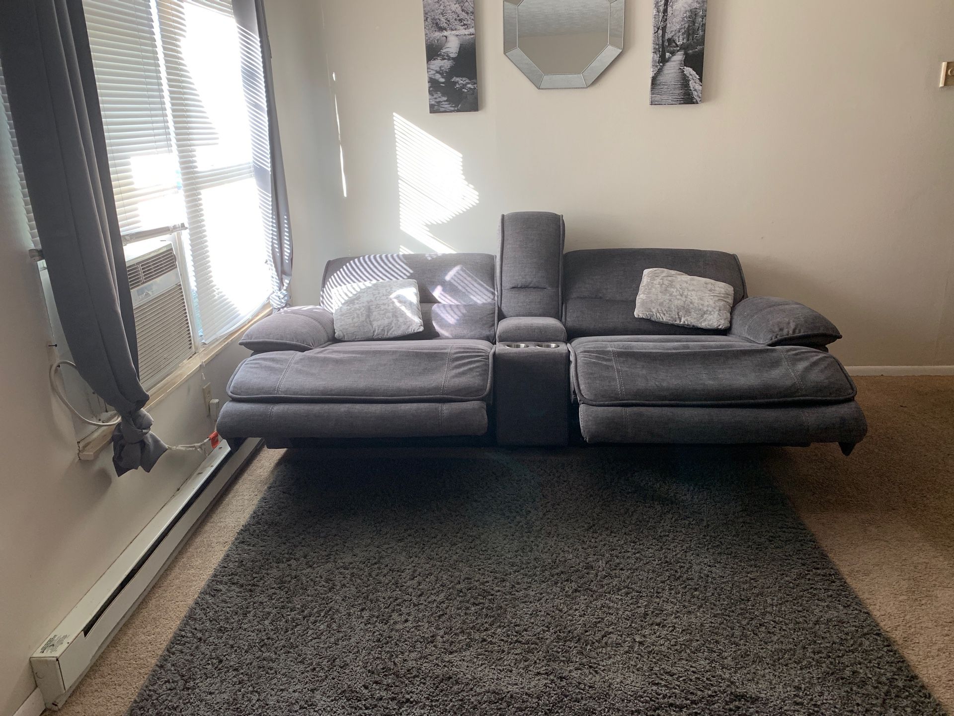 Gray sofa recliners with middle council