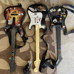 Guitar Hero Guitars and Microphone