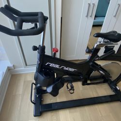 Leaning RealRyder Indoor Cycling Bike