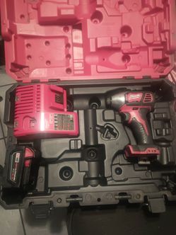 Milwaukee impact drill with battery and  charger