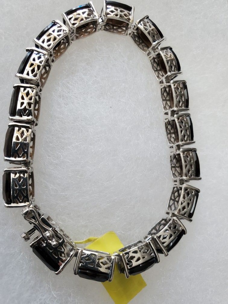 Brazilian Smokey Light Amethyst 50CTs 17 Stones Platinum Over STERLING Silver, $280