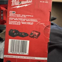 Milwaukee Battery And Charger 