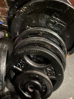 150 Lbs Of Plates With Bar Standard Size