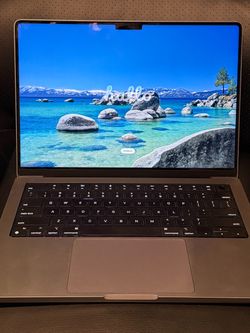 2021 14” MacBook Pro M1 Max 10 core CPU/24 core GPU, 32 GB RAM, 1TB SSD. Comes with power adapter. Small scratch on top case but everything works grea
