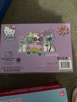 Hello kitty and bluey puzzles and hello kitty jewelry case
