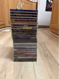 25 Music CDs U2 Cheap Trick Gloria Aerosmith Foo Fighters Moby