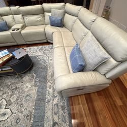 Leather Ivory Sofa With Power Recliner And Power Headrest