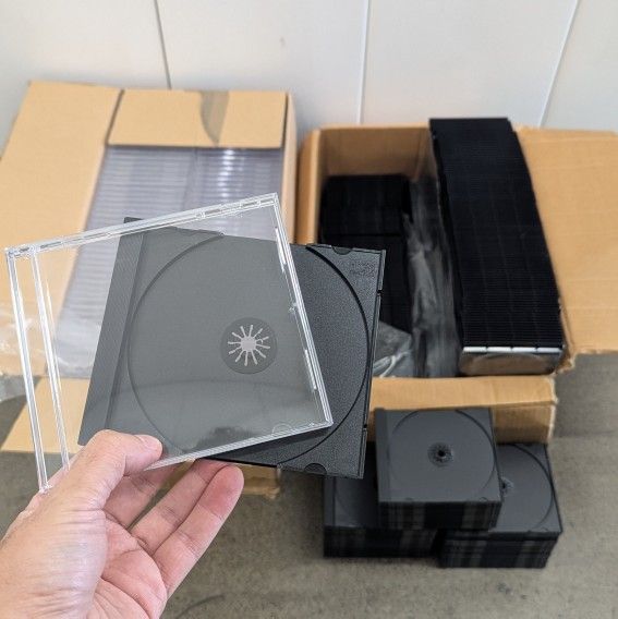 Approximately 400 unassembled CD jewel cases (new)