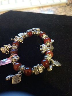 Red beaded charm bracelet