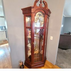 Cherry Wood Grandfather Clock. Approximately 6' tall & 3' wide