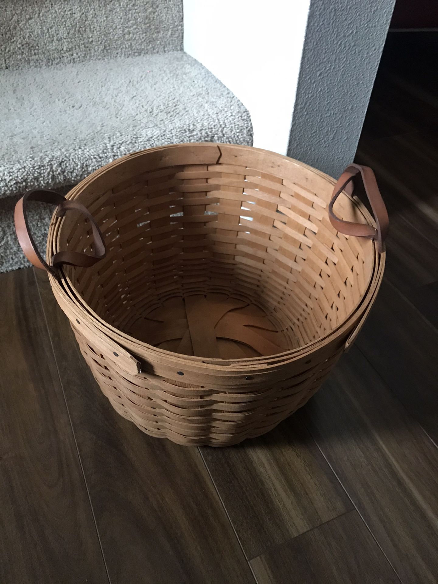 Longaberger basket with leather handles.