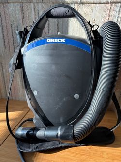 Oreck handheld canister vacuum unit