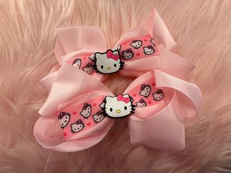 Moños con personaje Hello Kitty 🐱🎀