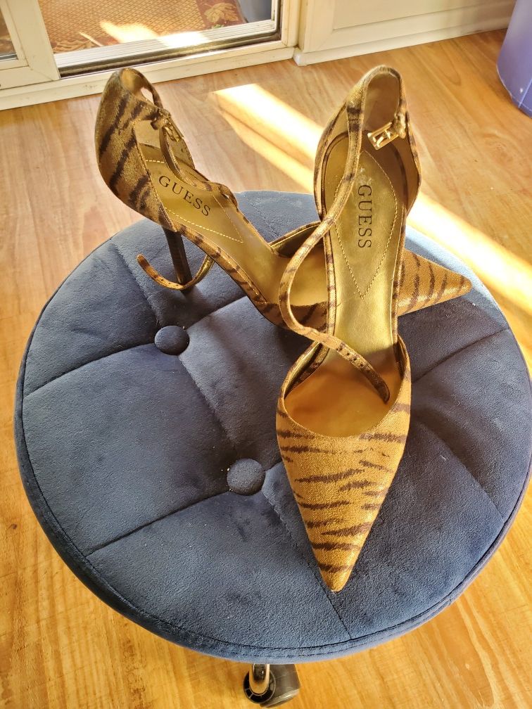 Guess. Brown tan animal print heel size 8 never used