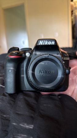 Nikon D3300 DSLR Camera Body, 18-55 mm lens, and camera bag
