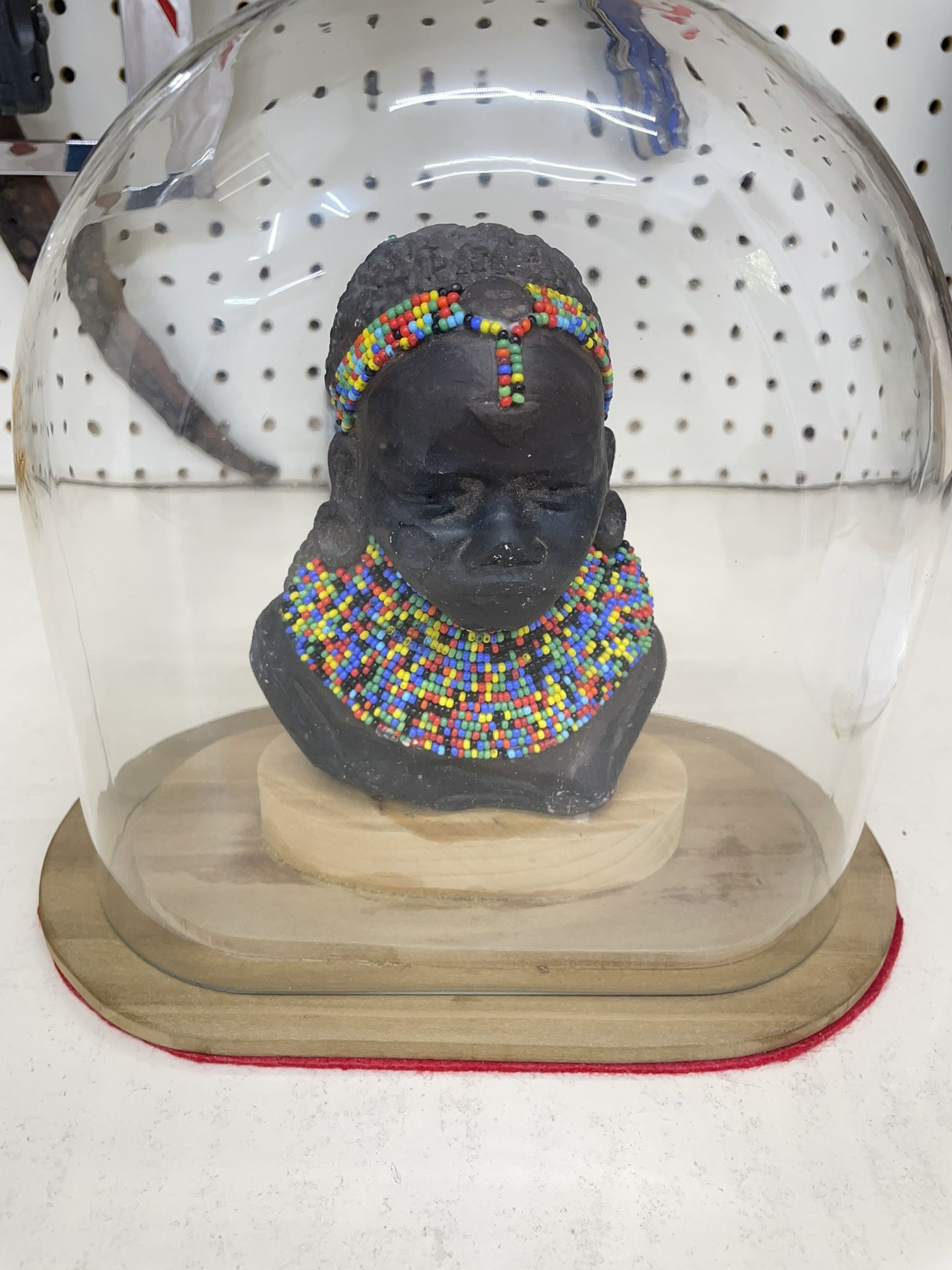 Art With Intricate Beadwork Under Glass Dome