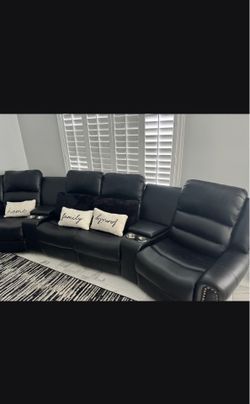 Sofa con asientos reclinable eléctrico .