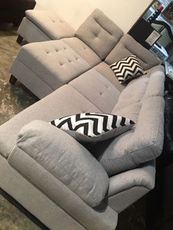 Light Grey Sectional with Storage Ottoman