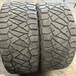 2 Used 295/55/20 NITTO RIDGEGRAPPLER TIRES