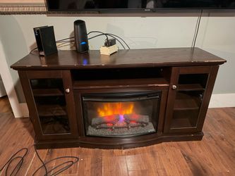 Dark wood electric fireplace media console