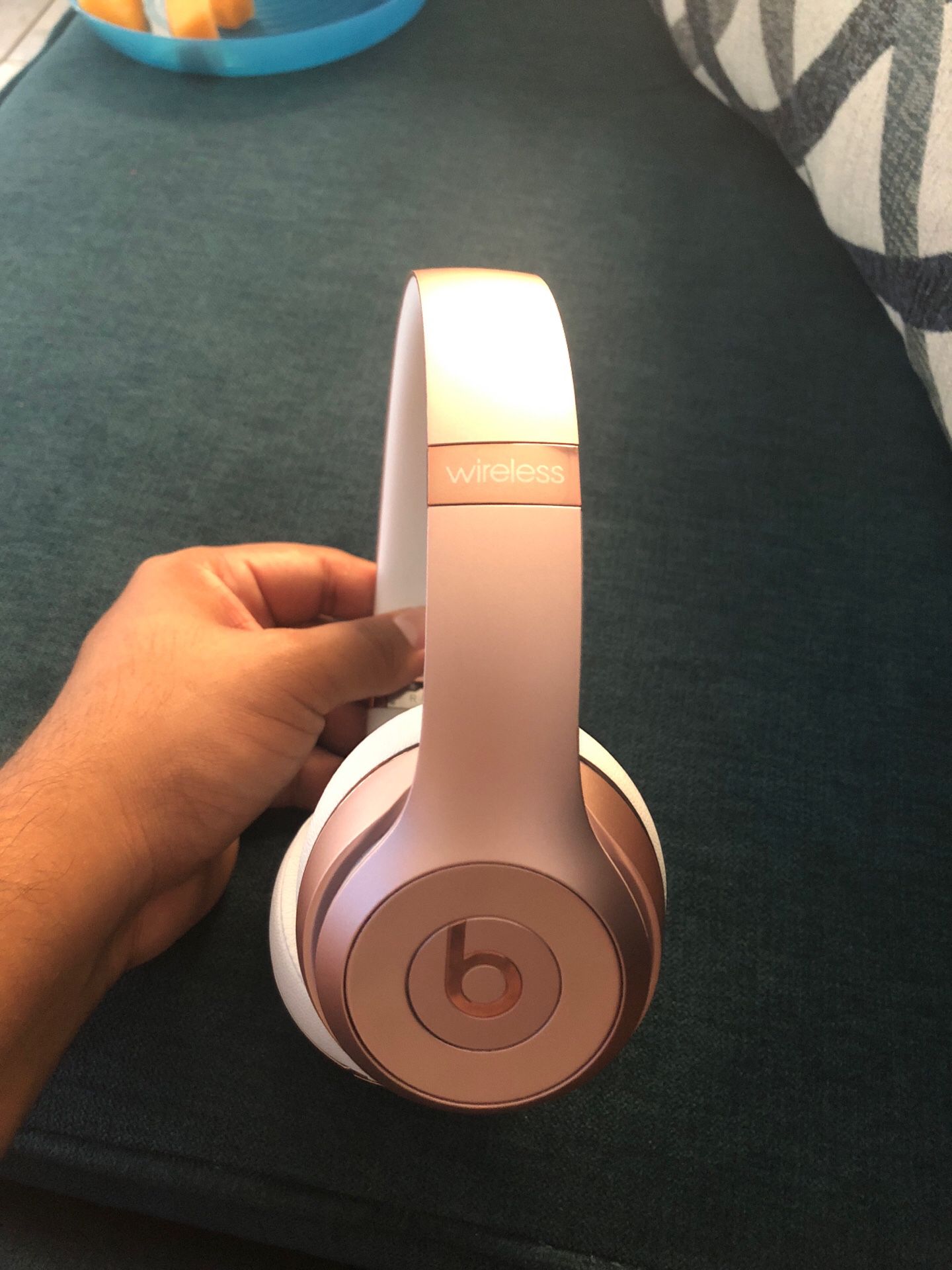 Rose gold wireless Beats headphones
